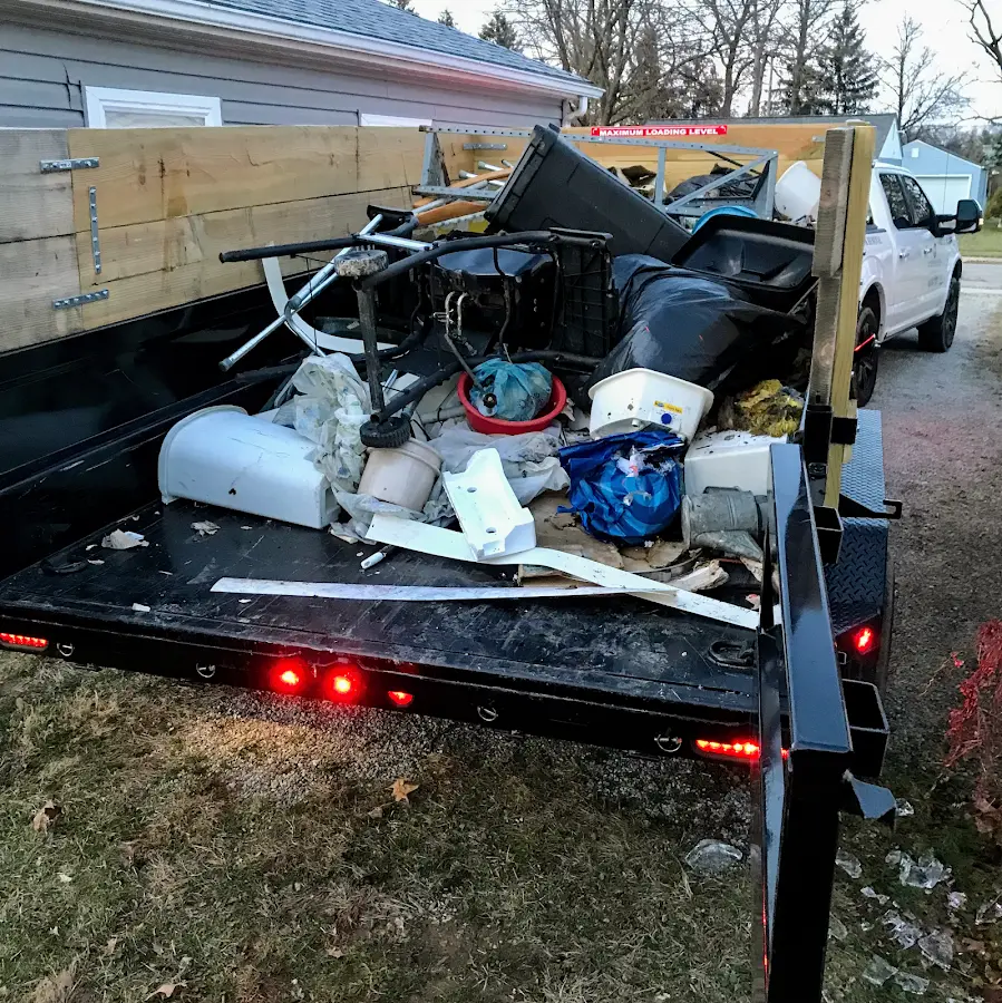 Roll-off dumpster delivered to a residential driveway in Olivette