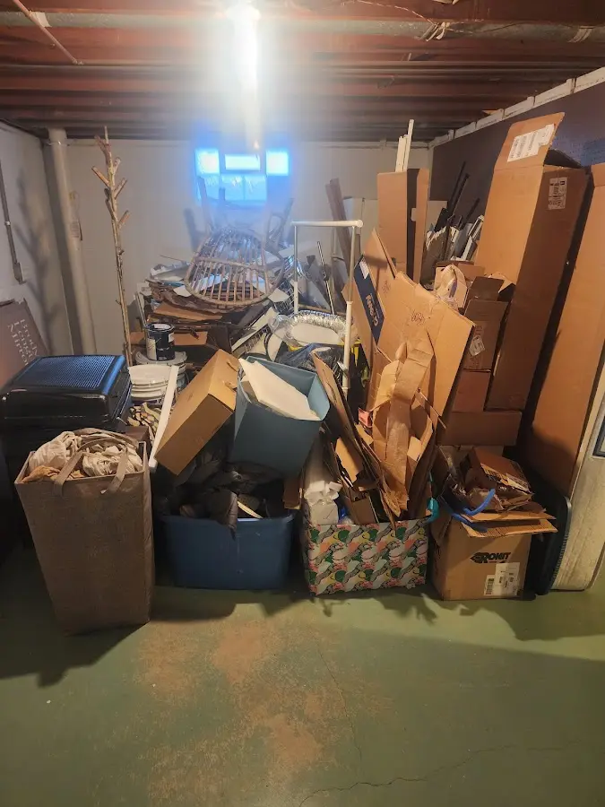 Roll-off dumpster container at job site for 15 Yard Dumpster Rental in Olivette